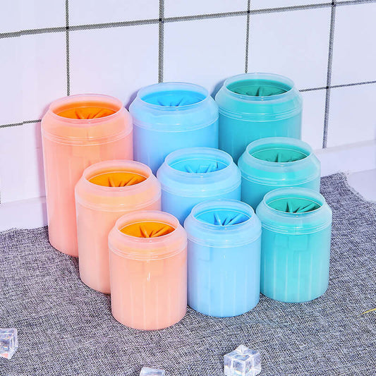 Pet Paw Cleaner Cleaning Kit Cup Soft Brush Can set in vibrant colors on a kitchen countertop.