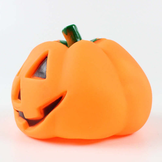 Teeth puzzle interactive cat and dog toy designed as a playful pumpkin with a smiling face.