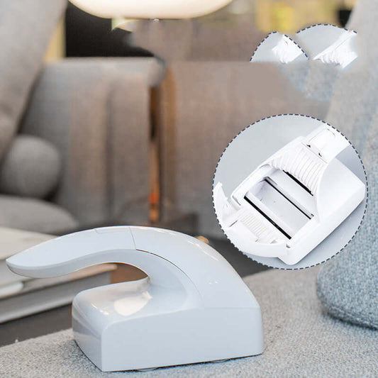 Pet Products Sticky Hair Remover Cat Hair Remover on a grey couch, highlighting its effective design for pet owners.